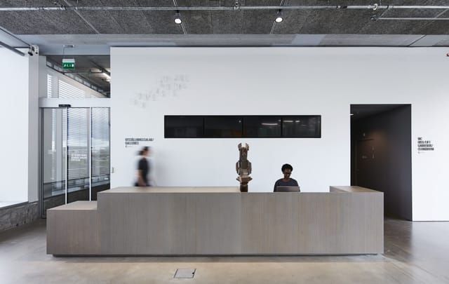 Minimalist registration desk at Bonniers Konsthall for corporate events and art exhibitions.