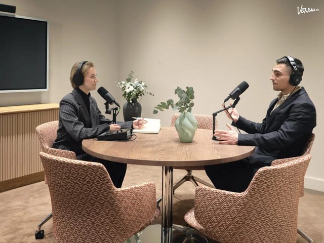 Origo Meeting Room 2: Podcast studio with professional sound equipment for content creation.