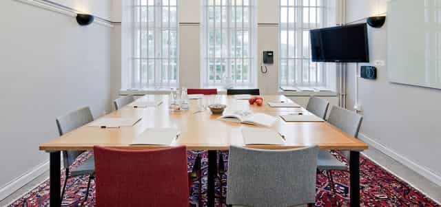 Bryggarsalen boardroom with square table for corporate meetings and professional conferences.