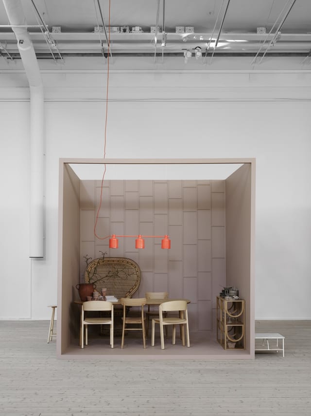Minimalist breakout meeting pod at Studios in Ark for trade show consultations.
