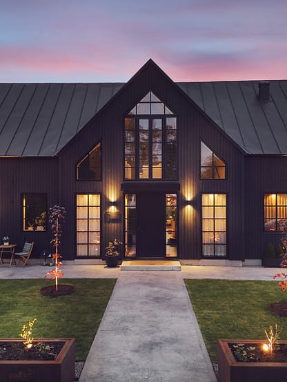 Modern boutique venue with warm lighting for intimate retreats and executive offsites.