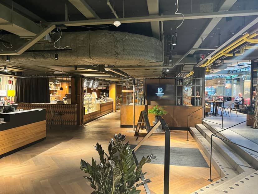 Downtown Camper Café: Industrial-chic event space for networking and creative sessions.