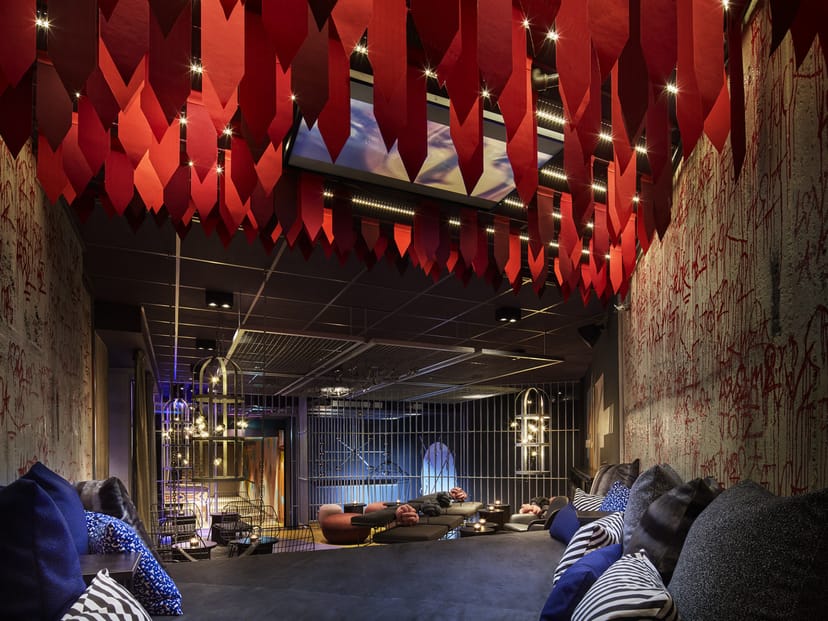 Avant-garde lounge at Hilma, featuring acoustic ceiling art for creative brainstorming events.