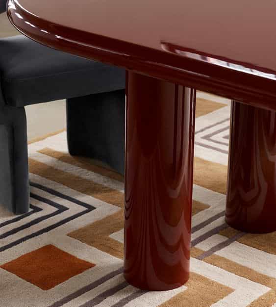 Red boardroom table at Centurion Stockholm for executive meetings and upscale private events.