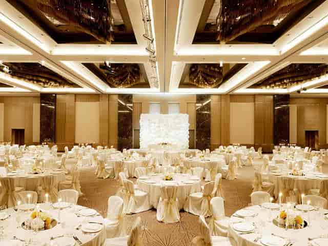 Nizami Ganjavi Grand Ballroom in Fairmont Baku with floral wall for corporate galas and weddings.