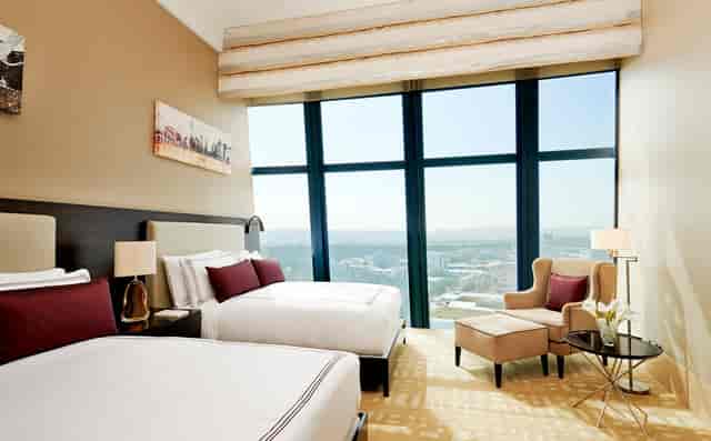 VIP meeting room with panoramic city views at Fairmont Baku for luxury corporate events.