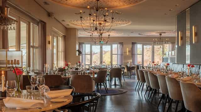 Elegant event venue in Djurgården, Stockholm with ambient lighting for corporate dinners and weddings.