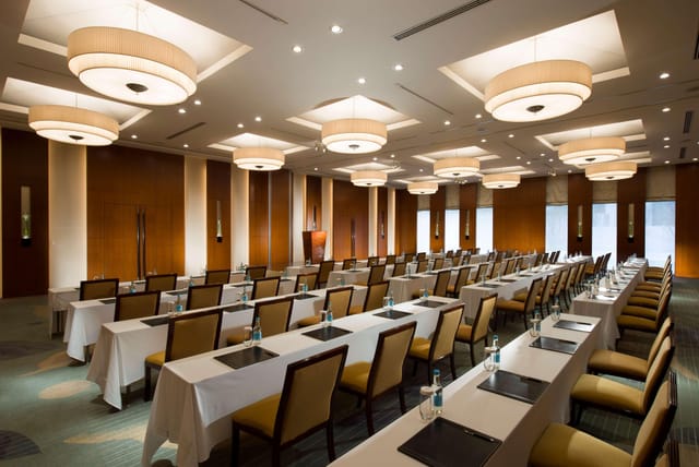 Versatile meeting space at Kazanami, Conrad Tokyo, ideal for workshops and conferences.