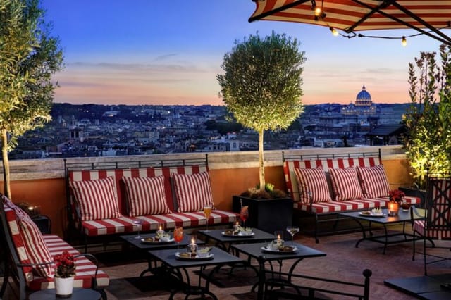Piano Lounge rooftop in Rome with sunset view for luxury networking and welcome receptions.