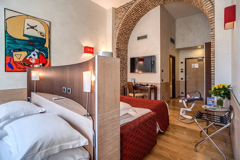 Luxury boutique hotel suite in Kolbe Hotel Rome, ideal for executive meetings and event planning.