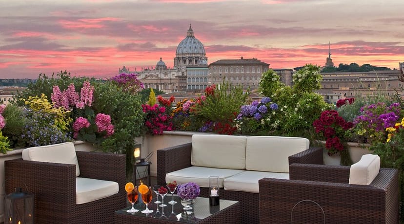 Luxury rooftop venue in Rome with St. Peter’s Basilica view for VIP welcome receptions.