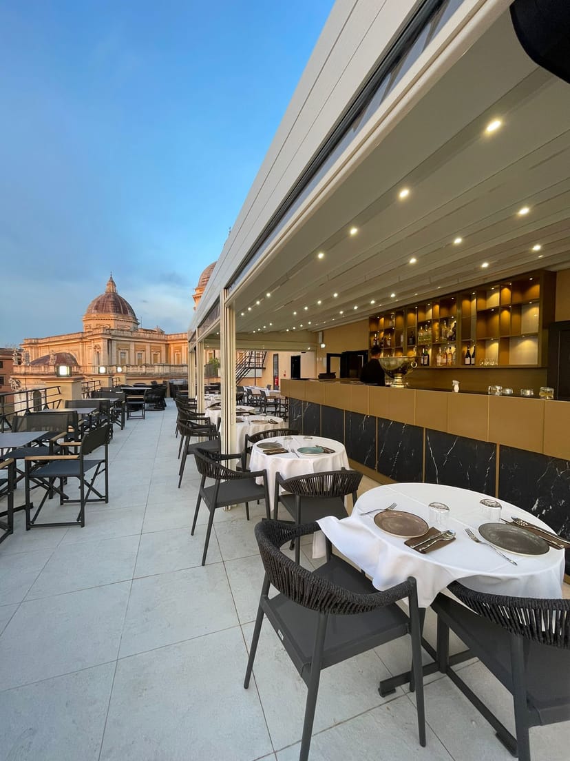 Masa Rooftop venue with retractable canopy for sunset receptions and VIP networking events.