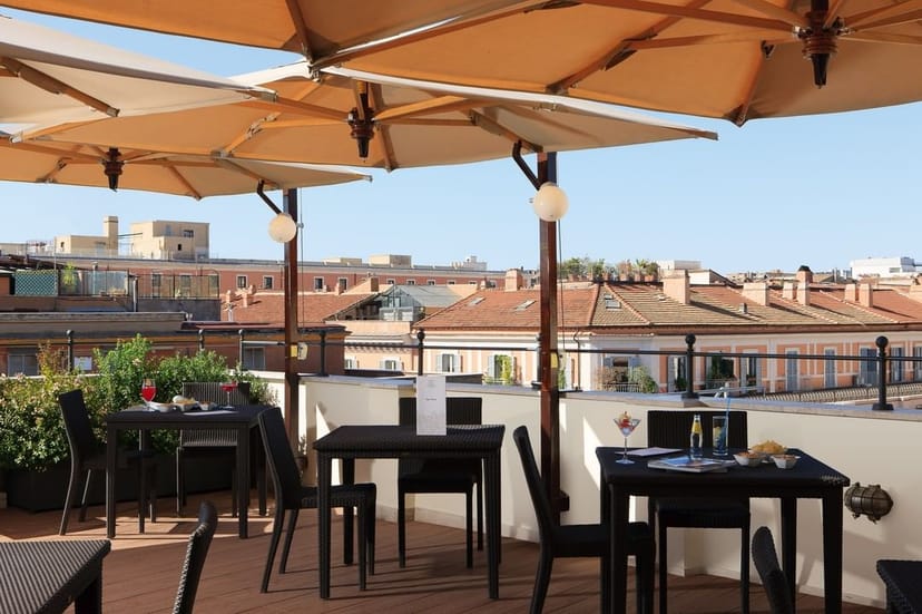 Rooftop suite terrace at Hotel Artemide for upscale corporate networking and cocktail events.