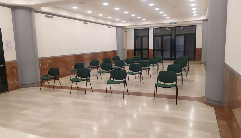 Centro Congressi Cavour breakout room: theater-style seating for corporate meetings and workshops.