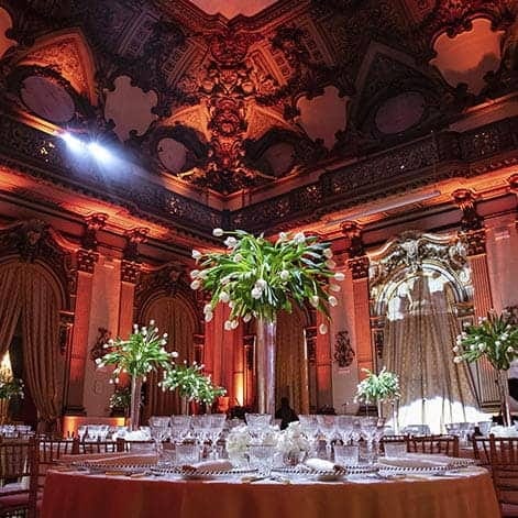Sala delle Vestali ballroom with tall tulip centerpieces for luxury wedding and gala events.