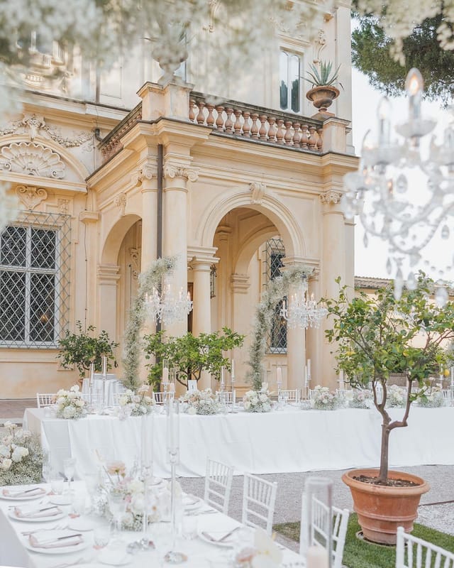 Luxury outdoor event with floral arches at Villa Aurelia, perfect for elegant wedding inspiration.
