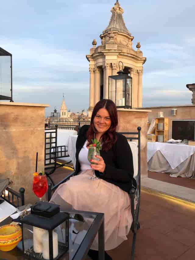 Corporate reception at Terrazza Borromini featuring iconic rooftop skyline and elegant event setup.