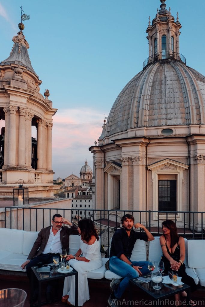 Corporate networking reception on a scenic Rome rooftop terrace for incentive travel events.