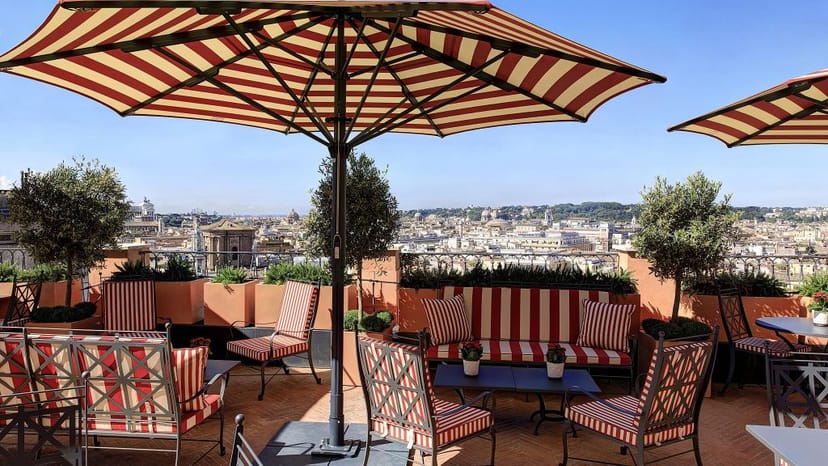 Luxury rooftop terrace at Hotel de la Ville for corporate cocktail events and VIP networking.