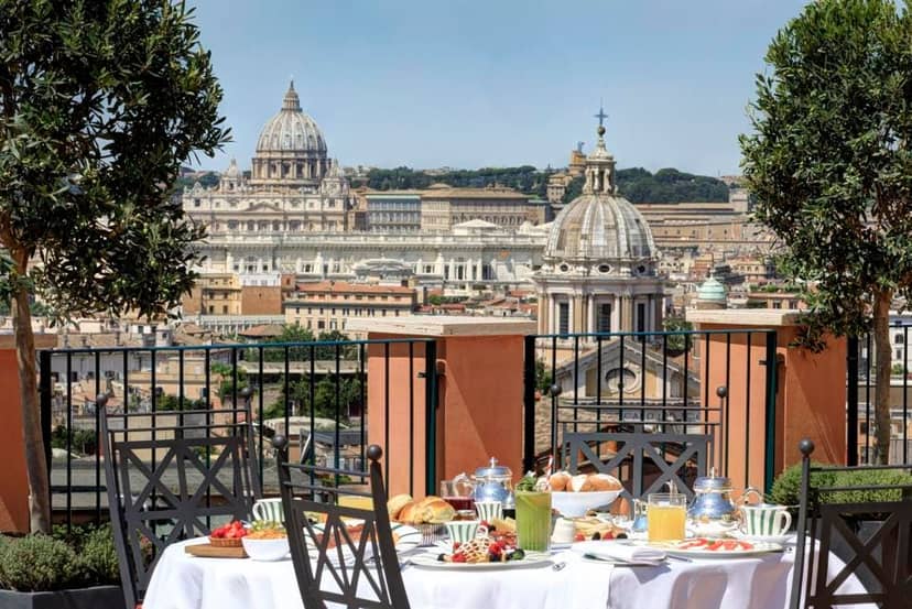 Myths & Legends venue: Iconic Roman skyline backdrop for VIP breakfast and corporate reception.
