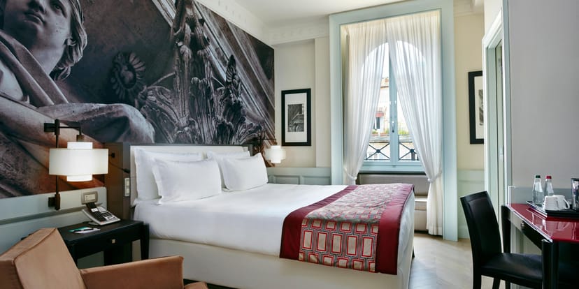 Luxury conference room at Hotel Indigo Rome St. George for VIP executive meetings and events.