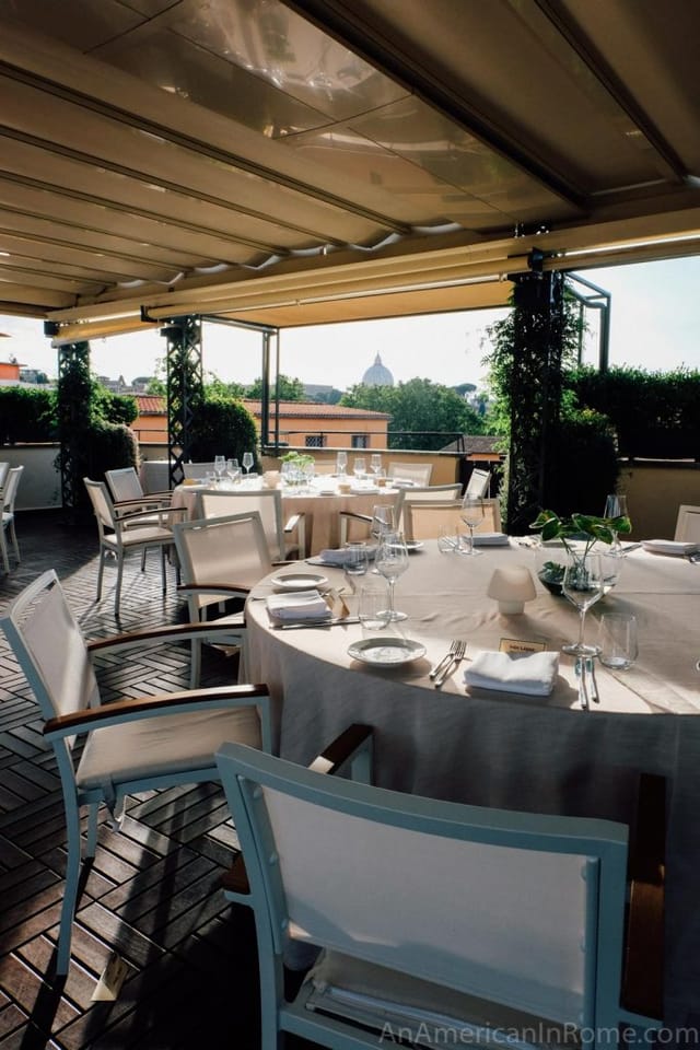 Rooftop hotel suite in Rome with St. Peter’s Basilica view for corporate dinner and incentive event.