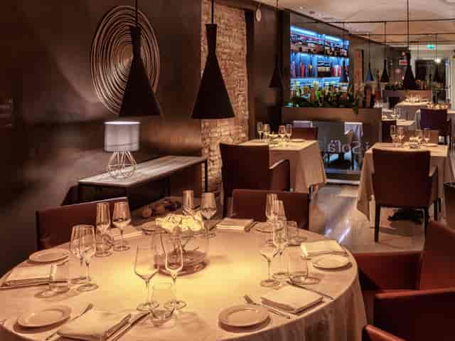 Sophisticated Hotel Indigo Rome suite set for high-end corporate dinner and VIP reception.