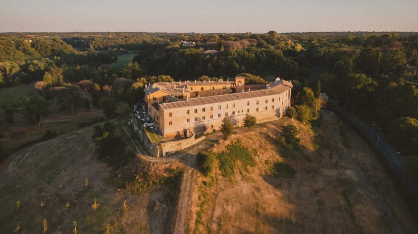 Cloister at Castello di Decima: luxury wedding and corporate retreat venue with sunset views.