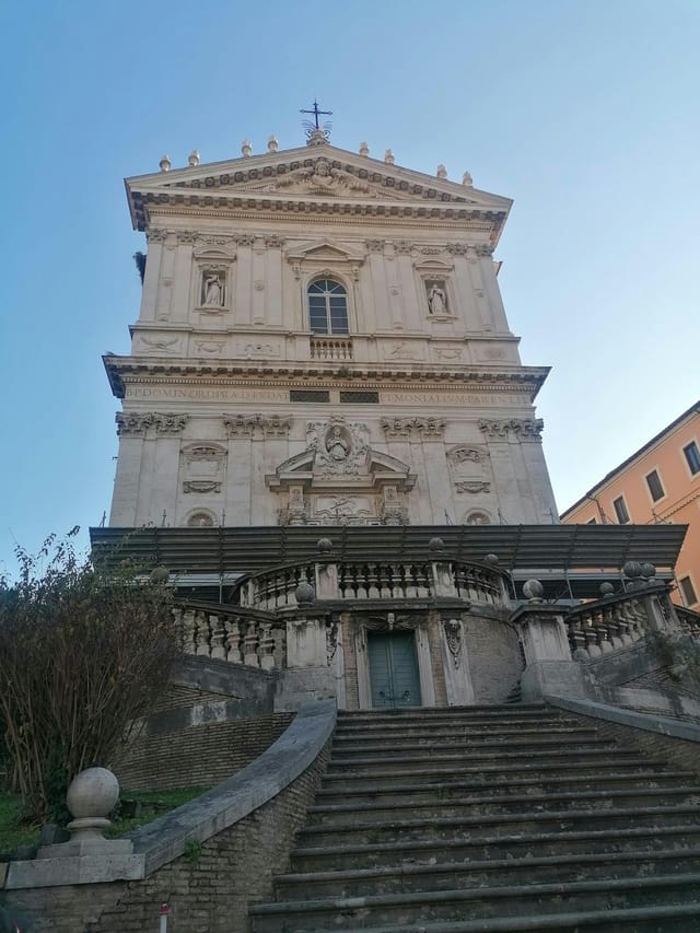 Dramatic staircase at Aula Minor, Angelicum: Ideal historic gala venue and event space.