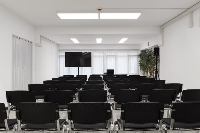 Sala Q theater-style layout for professional conferences and corporate events at Centro Congressi.