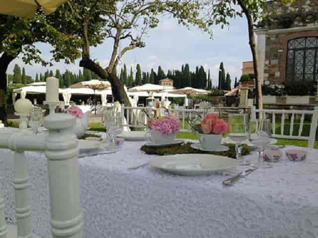 Villa dei Cesari outdoor dining setup for upscale wedding reception and luxury event venue.
