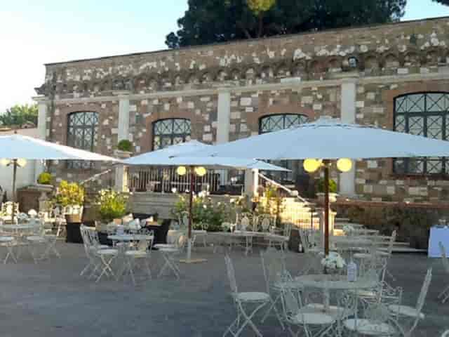 Villa dei Cesari outdoor patio with bistro seating for al fresco events and networking receptions.