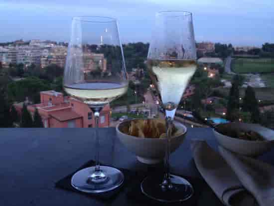 Sky Stars rooftop lounge at A.Roma Hotel, ideal for social events and aperitivo networking.