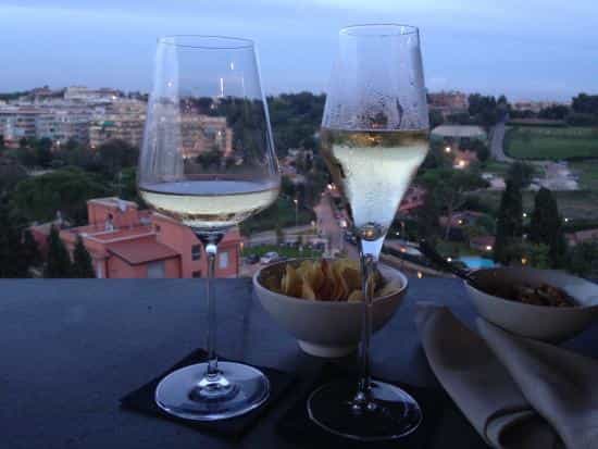 Sky Stars rooftop lounge at A.Roma Hotel, ideal for social events and aperitivo networking.