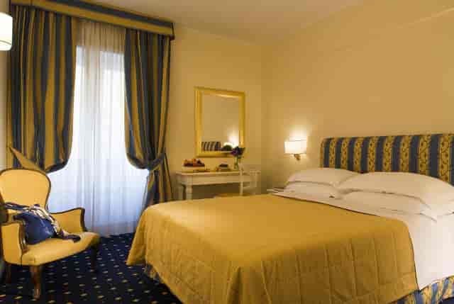 Hotel Napoleon guest lounge with classic decor for corporate lodging and group room blocks.