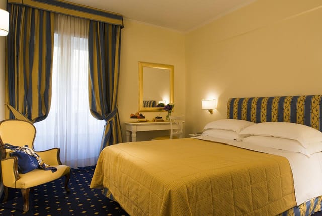 Hotel Napoleon guest lounge with classic decor for corporate lodging and group room blocks.