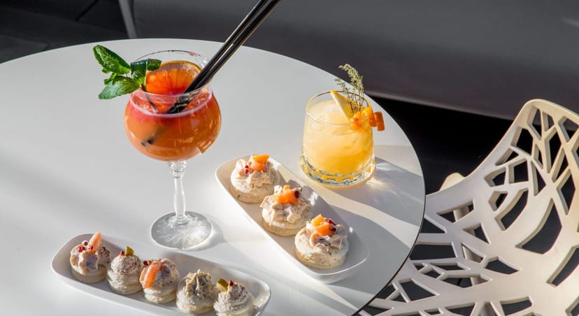 Tiziano Terrace cocktail party: elegant hors d'oeuvres at Monti Palace for luxury networking events.
