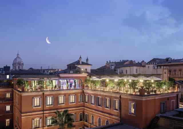 Rooftop terrace in Rome for VIP networking and evening receptions with historic architecture.