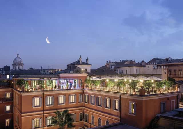 Rooftop terrace in Rome for VIP networking and evening receptions with historic architecture.