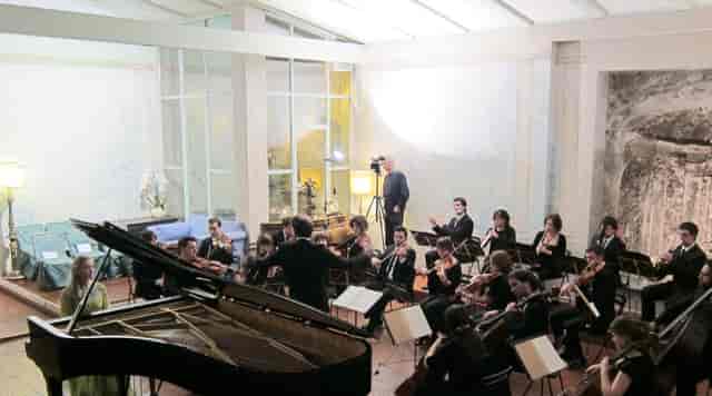 Chamber orchestra in Villa Sospisio Nympheum hall for luxury event venue hire.