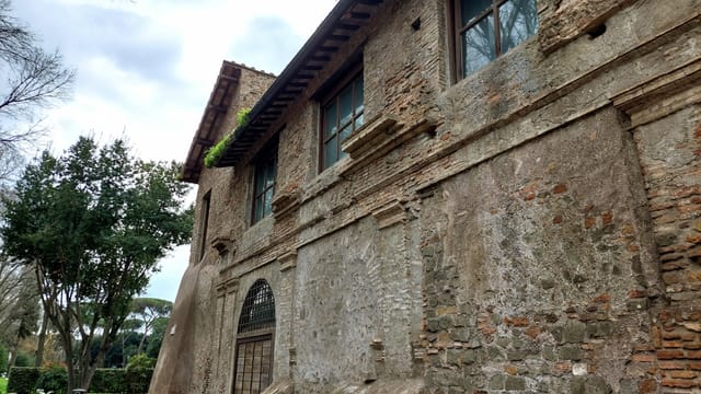 Rustic-chic Complesso Vignola Mattei chapel exterior for historic-themed incentive dinner events.