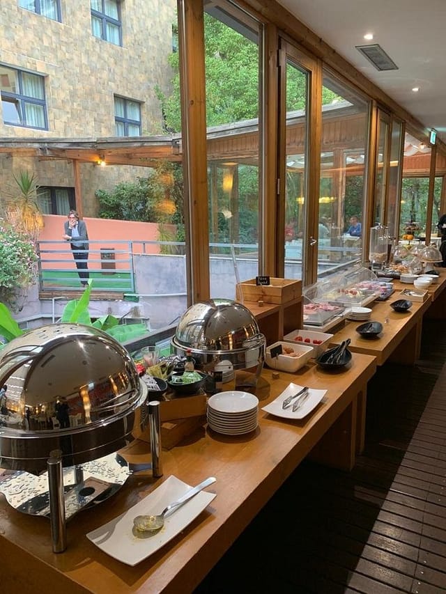 Breakfast buffet at Hotel Abitart with stainless chafing dishes for hotel events and catering.