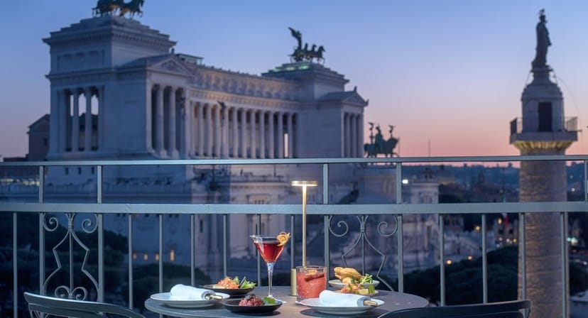 VIP reception on NH Collection Roma Centro terrace with iconic Roman backdrop for premium events.