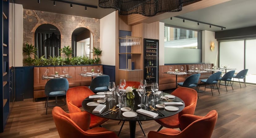 Semi-private dining area at NH Collection Roma Centro for corporate dinners and VIP meetings.