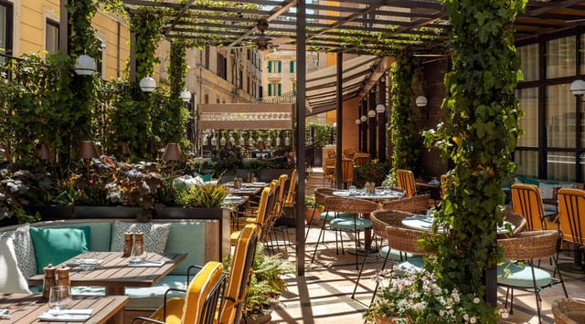 Outdoor event space at The Hoxton Rome with lounge seating for networking and al fresco dining.