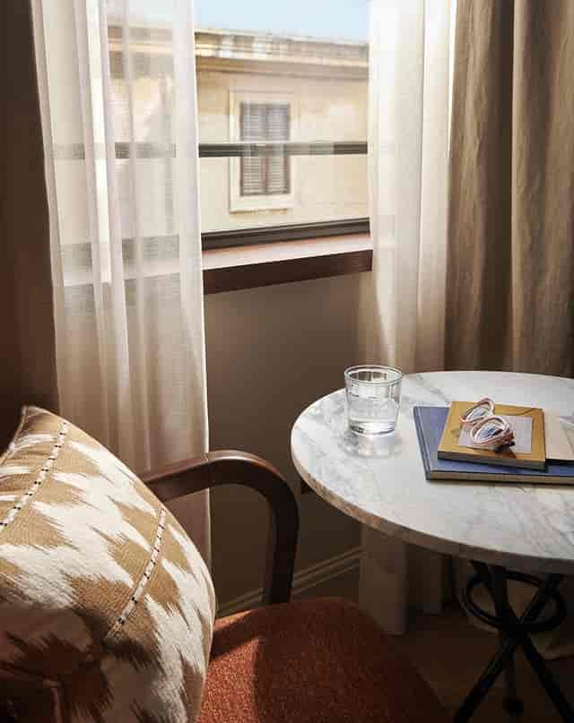 VIP guest room nook at The Hoxton Rome for private reflection or remote work.