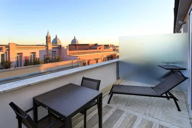 Hotel Universo terrace for VIP networking and premium corporate event site inspections.