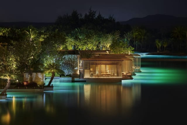 Jade Bar at The Rome EDITION featuring ambient water decor for executive retreats and receptions.