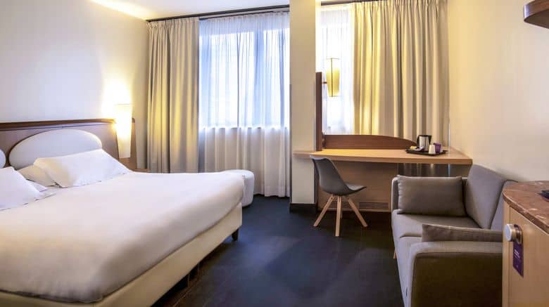 Mercure Eur Roma West hotel suite with workspace for business conferences and corporate travel.