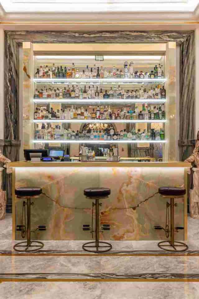 Illuminated luxury bar at Aleph Rome Hotel for premium evening receptions and VIP networking.